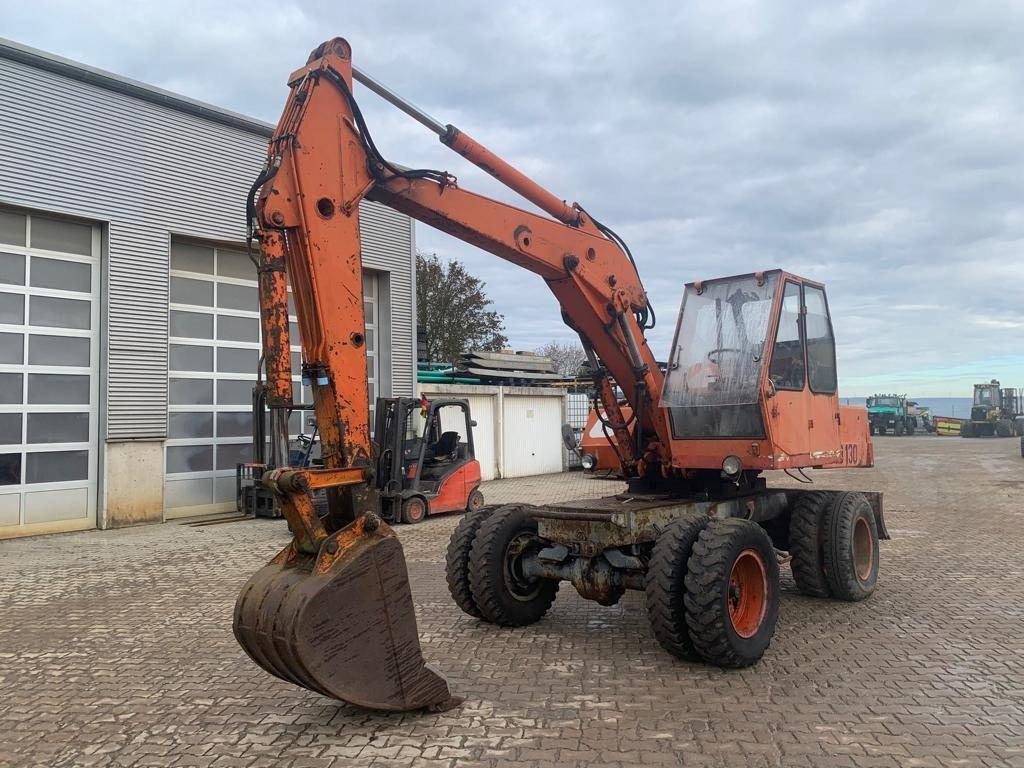 Atlas AB1302 / AB1500 mit Löffel und Greifer - Pelle sur pneus: photos 1 Atlas AB1302 / AB1500 mit Löffel und Greifer - Pelle sur pneus: photos 1