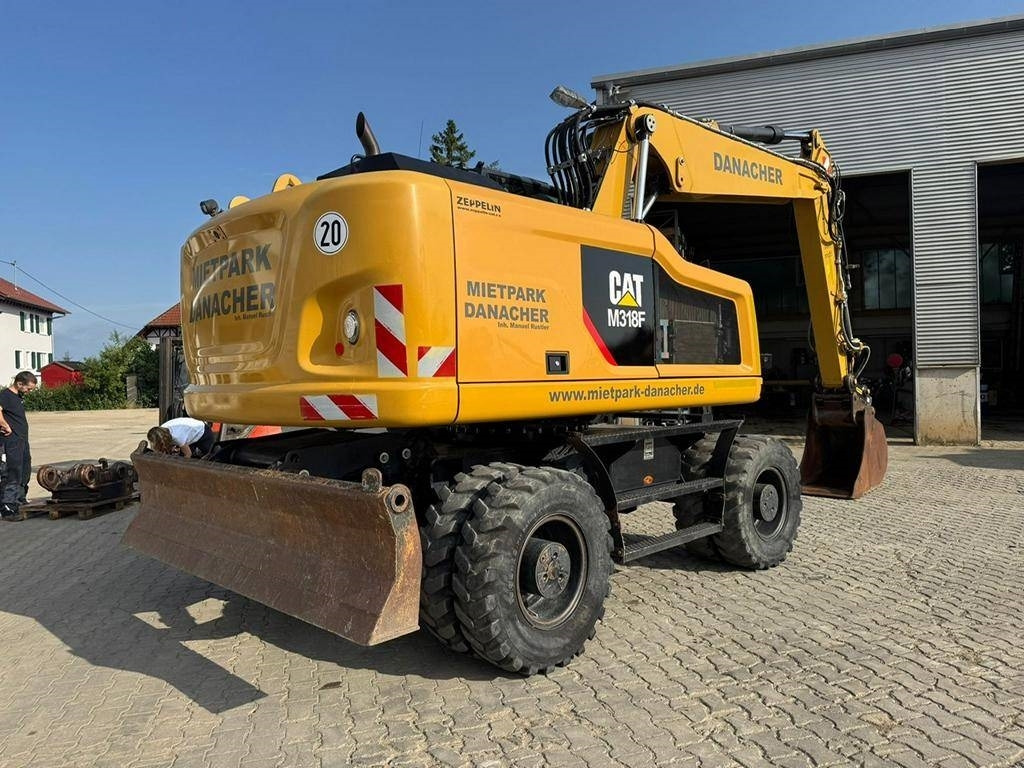 CAT M 318 F - Pelle sur pneus: photos 5 CAT M 318 F - Pelle sur pneus: photos 5