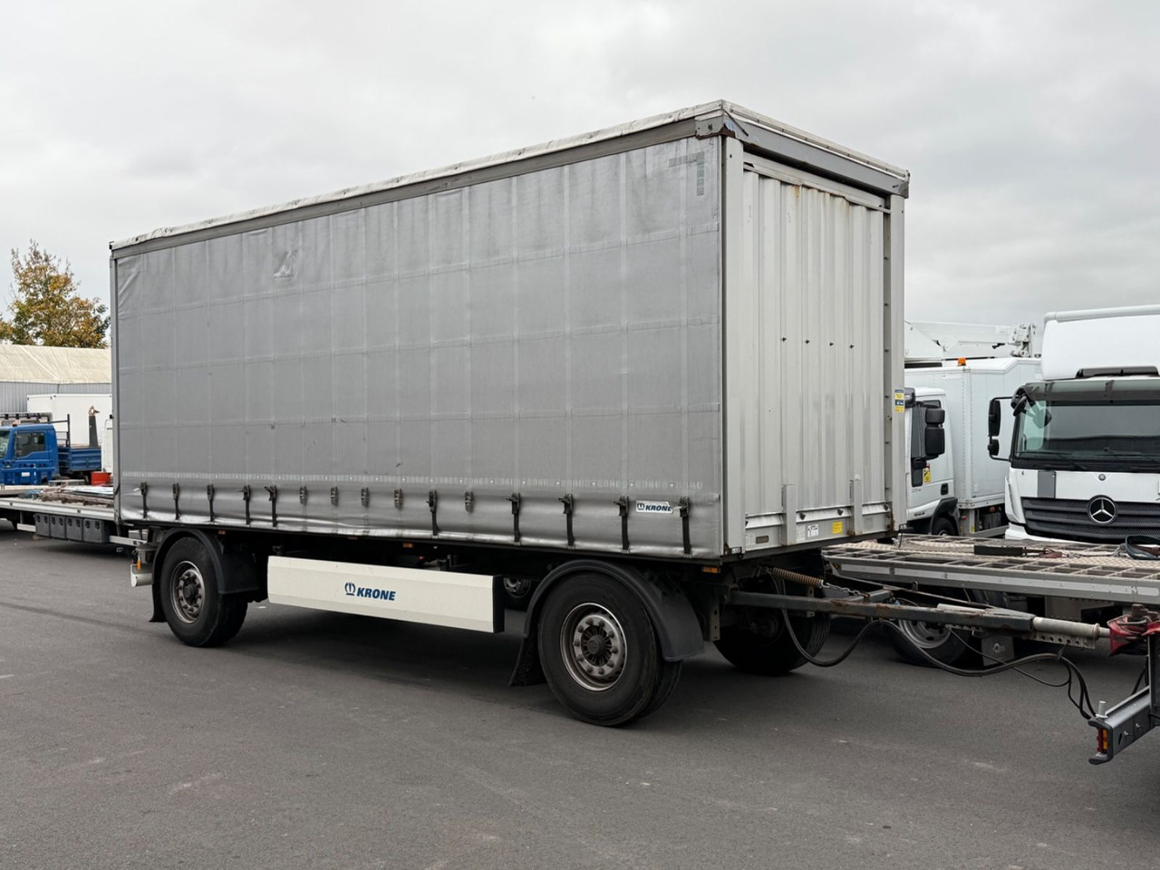 Krone AZ 18F DB06CLNF Curtainsider Pritsche/Plane - Remorque rideaux coulissants: photos 1 Krone AZ 18F DB06CLNF Curtainsider Pritsche/Plane - Remorque rideaux coulissants: photos 1