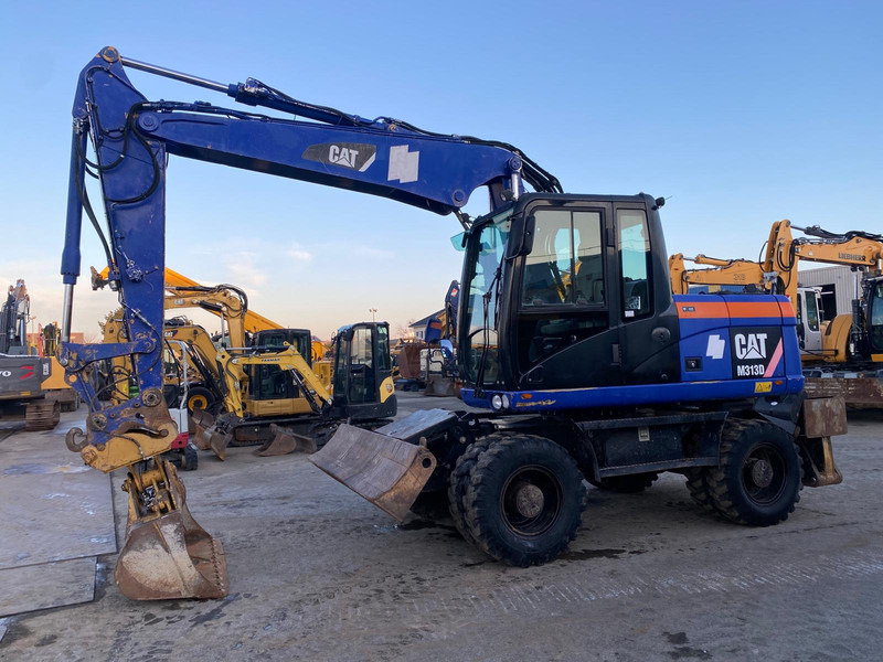 Caterpillar M313D NVT - Pelle: photos 2 Caterpillar M313D NVT - Pelle: photos 2