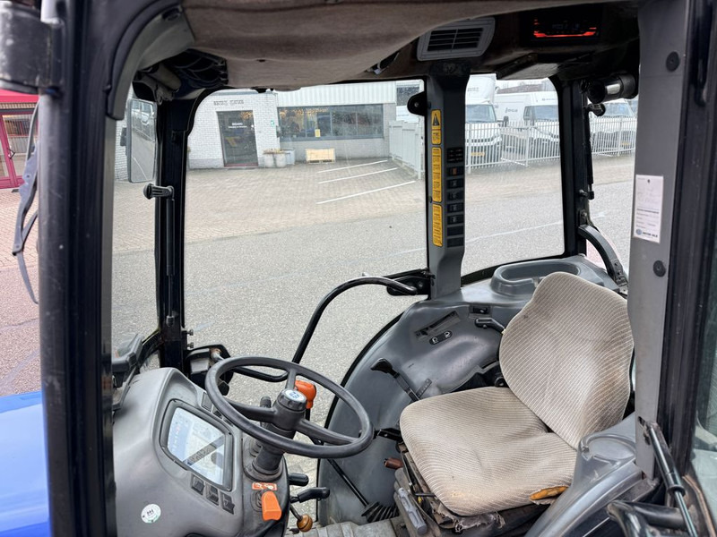 New Holland TN95NA Smalspoortrekker - Micro tracteur: photos 5 New Holland TN95NA Smalspoortrekker - Micro tracteur: photos 5