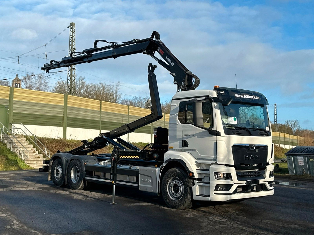 MAN TGS 26.470 6x2 Abrollkipper + Kran Hiab 138-3 - Camion ampliroll, Camion grue: photos 1 MAN TGS 26.470 6x2 Abrollkipper + Kran Hiab 138-3 - Camion ampliroll, Camion grue: photos 1