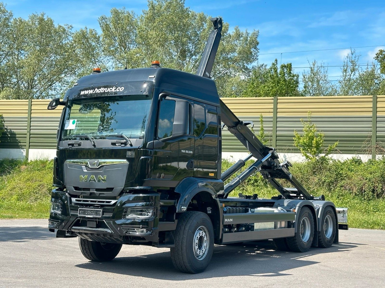 MAN TGS 33.520 6X4 Euro6e Abrollkipper MULTILIFT - Camion ampliroll, Camion grue: photos 1 MAN TGS 33.520 6X4 Euro6e Abrollkipper MULTILIFT - Camion ampliroll, Camion grue: photos 1