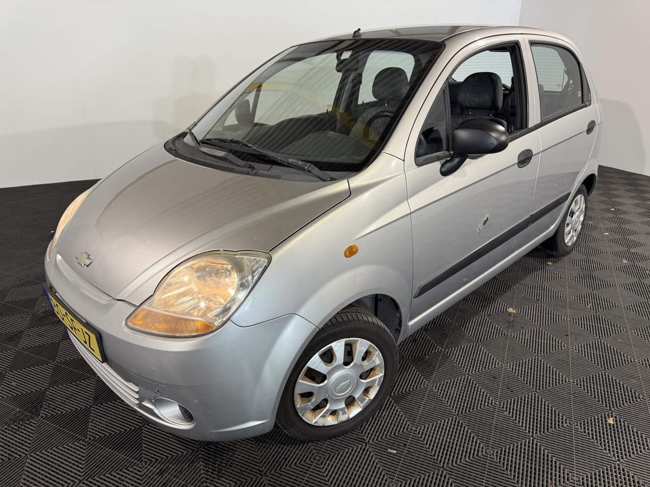 Chevrolet | Matiz | 0.8 Spirit | 2005 | 98.162 km | 30SFJZ | Logisch - Voiture à hayon: photos 1 Chevrolet | Matiz | 0.8 Spirit | 2005 | 98.162 km | 30SFJZ | Logisch - Voiture à hayon: photos 1