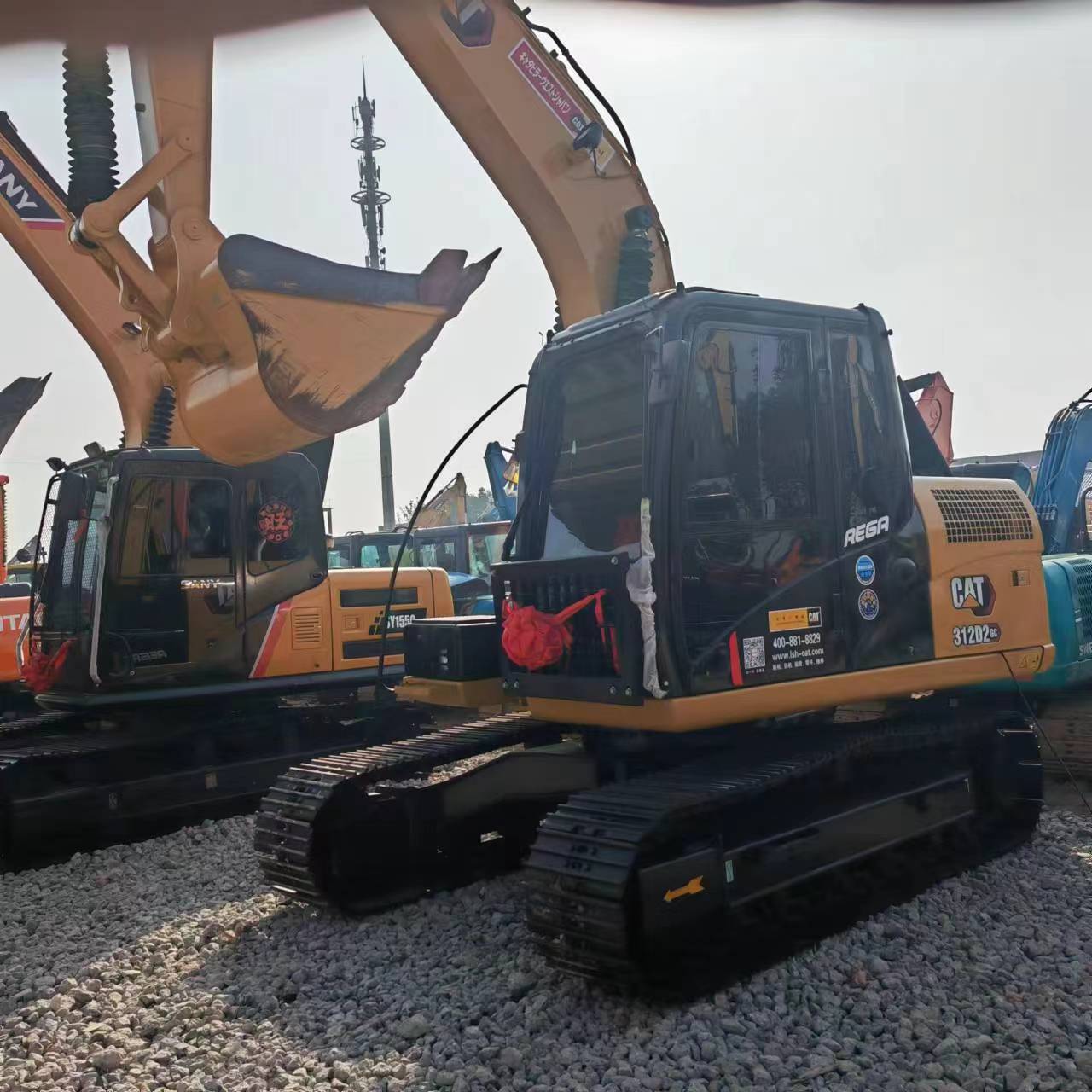 CATERPILLAR 312D2 - Pelle sur chenille: photos 3 CATERPILLAR 312D2 - Pelle sur chenille: photos 3