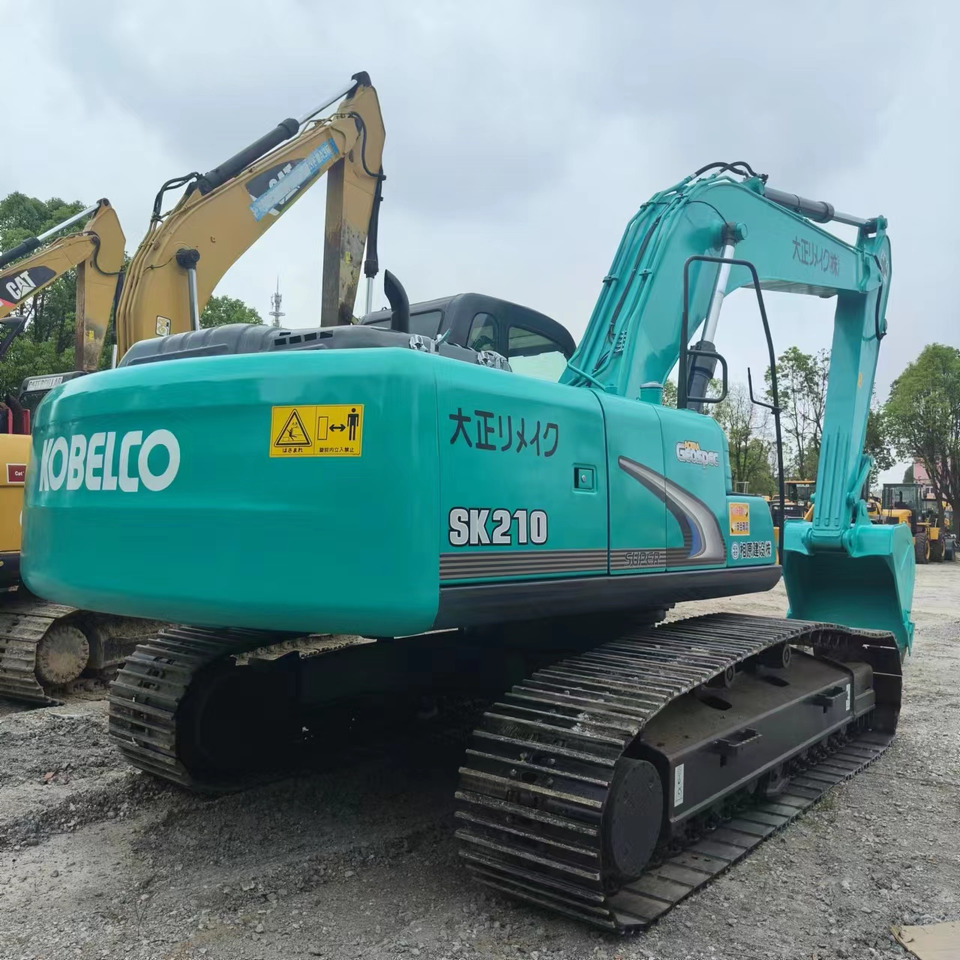 KOBELCO SK210 - Pelle sur chenille: photos 5 KOBELCO SK210 - Pelle sur chenille: photos 5