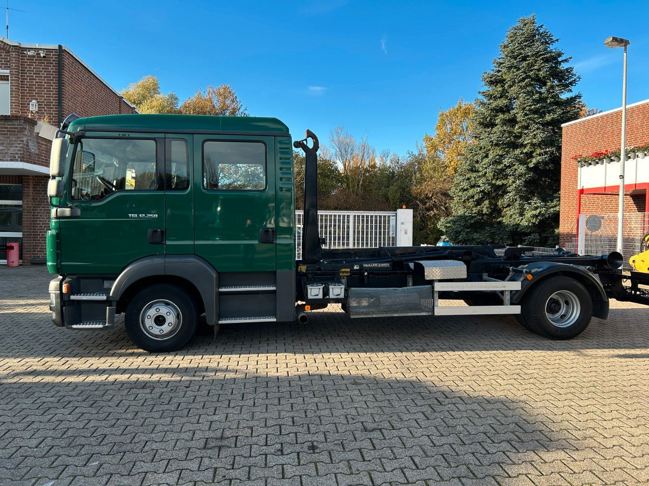 MAN 12.250 Doppelkabine Abroller - Camion ampliroll: photos 2 MAN 12.250 Doppelkabine Abroller - Camion ampliroll: photos 2