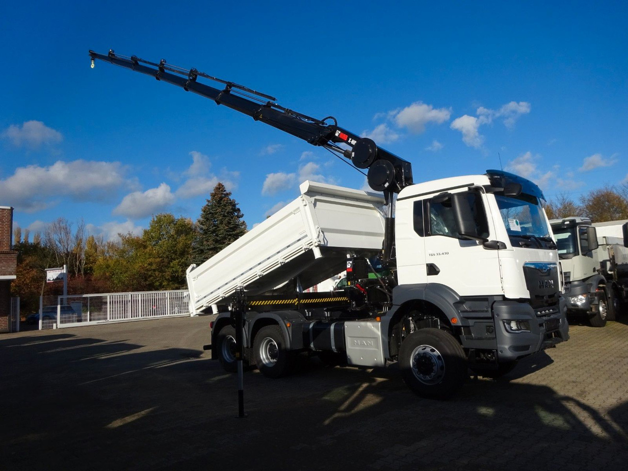MAN 33.430 6x6 3-SEITENKIPPER KRAN HIAB 228- 6HYDRO - Camion benne, Camion grue: photos 1 MAN 33.430 6x6 3-SEITENKIPPER KRAN HIAB 228- 6HYDRO - Camion benne, Camion grue: photos 1