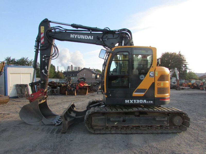 Hyundai HX 130 ALCR Kettenbagger 77.500 EUR / AC - Pelle sur chenille: photos 1 Hyundai HX 130 ALCR Kettenbagger 77.500 EUR / AC - Pelle sur chenille: photos 1
