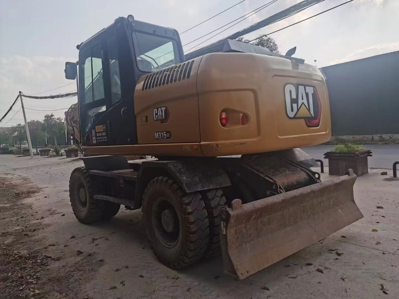 CATERPILLAR M315GC - Pelle sur pneus: photos 5 CATERPILLAR M315GC - Pelle sur pneus: photos 5