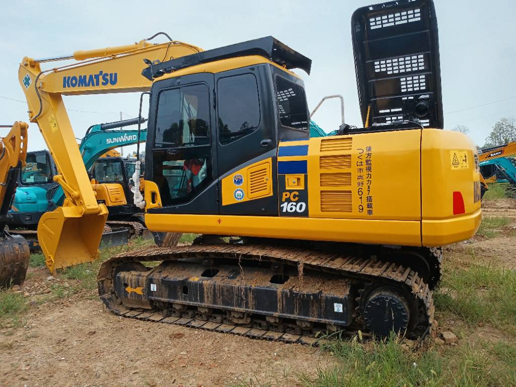 Komatsu PC 160 - Pelle sur chenille: photos 1 Komatsu PC 160 - Pelle sur chenille: photos 1