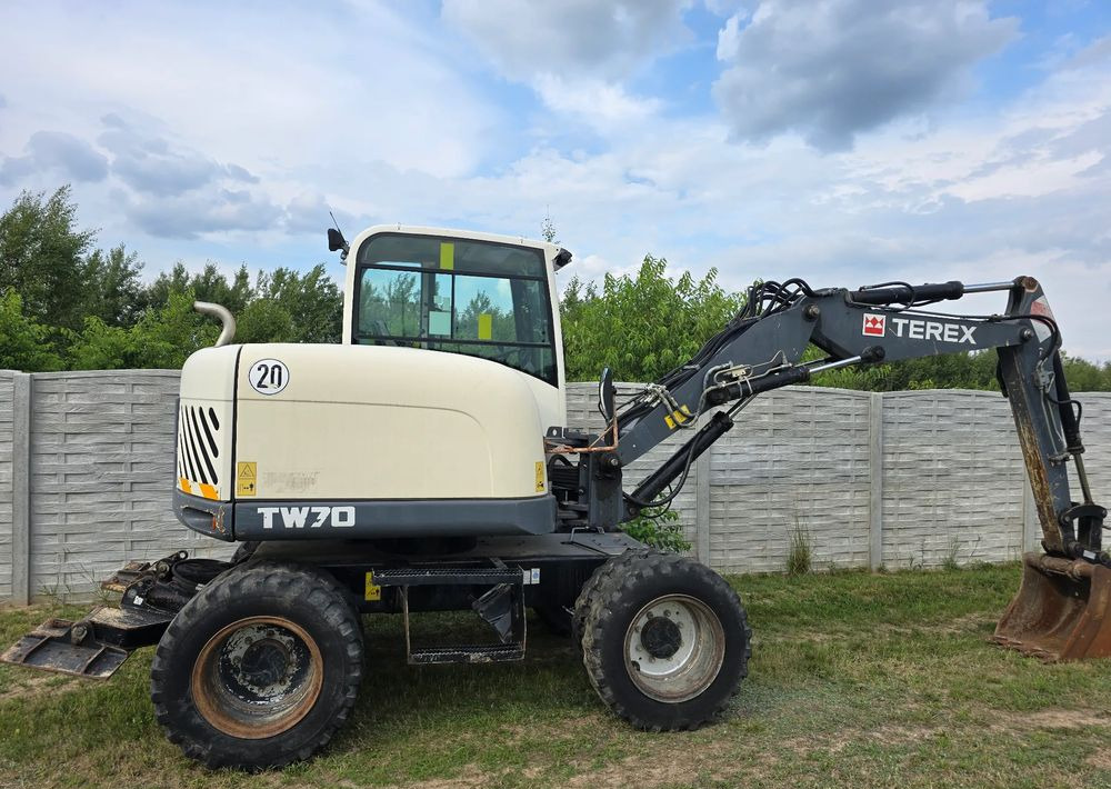 Pelle sur pneus Terex: photos 12