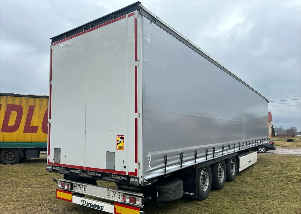 Krone STANDARD 2021 podnoszona oś OPONY 70% / STAN BARDZO DOBRY / OD PIERWSZEGO WŁAŚCICIELA / PALECIARA / TOP / sprowadzona z Niemiec !! - Semi-remorque rideaux coulissants: photos 1 Krone STANDARD 2021 podnoszona oś OPONY 70% / STAN BARDZO DOBRY / OD PIERWSZEGO WŁAŚCICIELA / PALECIARA / TOP / sprowadzona z Niemiec !! - Semi-remorque rideaux coulissants: photos 1