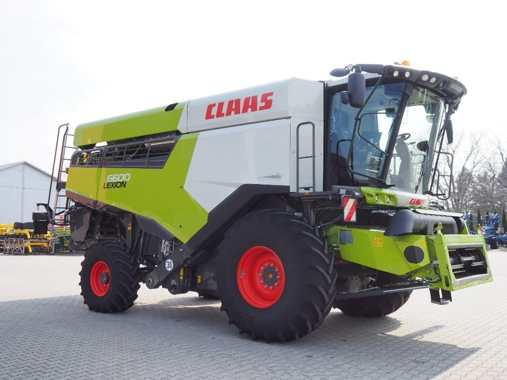 Claas Lexion 6600 GPS + V770 - Moissonneuse-batteuse: photos 4 Claas Lexion 6600 GPS + V770 - Moissonneuse-batteuse: photos 4