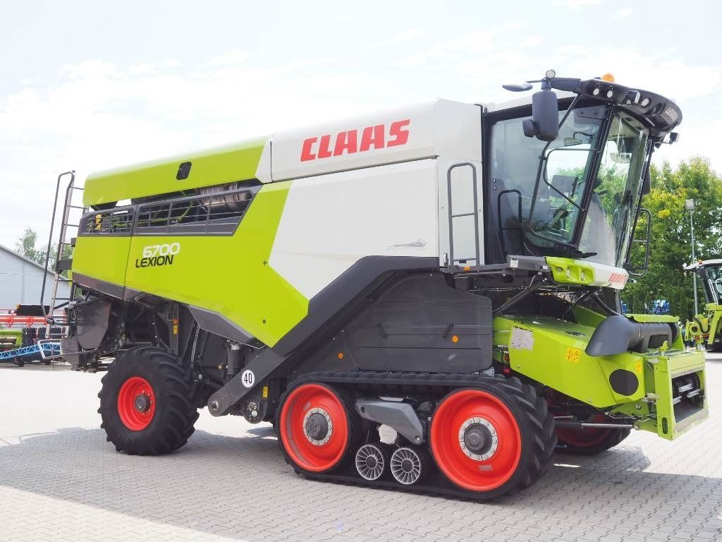 Claas Lexion 6700TT GPS + V770 - Moissonneuse-batteuse: photos 4 Claas Lexion 6700TT GPS + V770 - Moissonneuse-batteuse: photos 4
