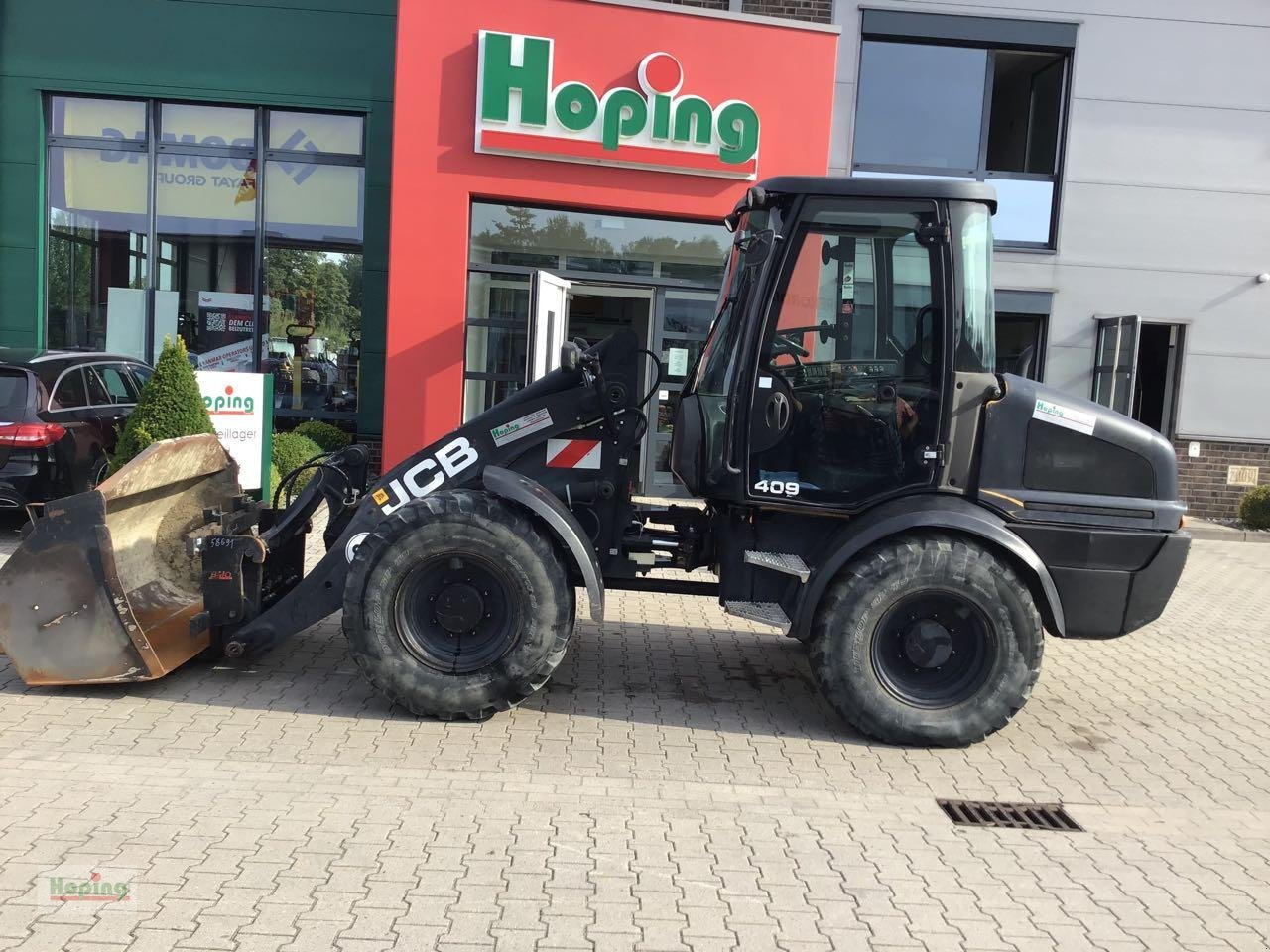 JCB 409 - Chargeuse sur pneus: photos 1 JCB 409 - Chargeuse sur pneus: photos 1
