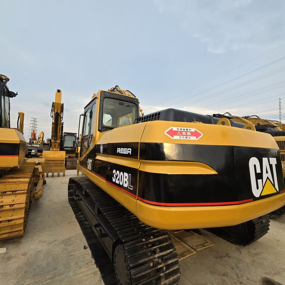 Caterpillar 320BL - Pelle sur chenille: photos 3 Caterpillar 320BL - Pelle sur chenille: photos 3