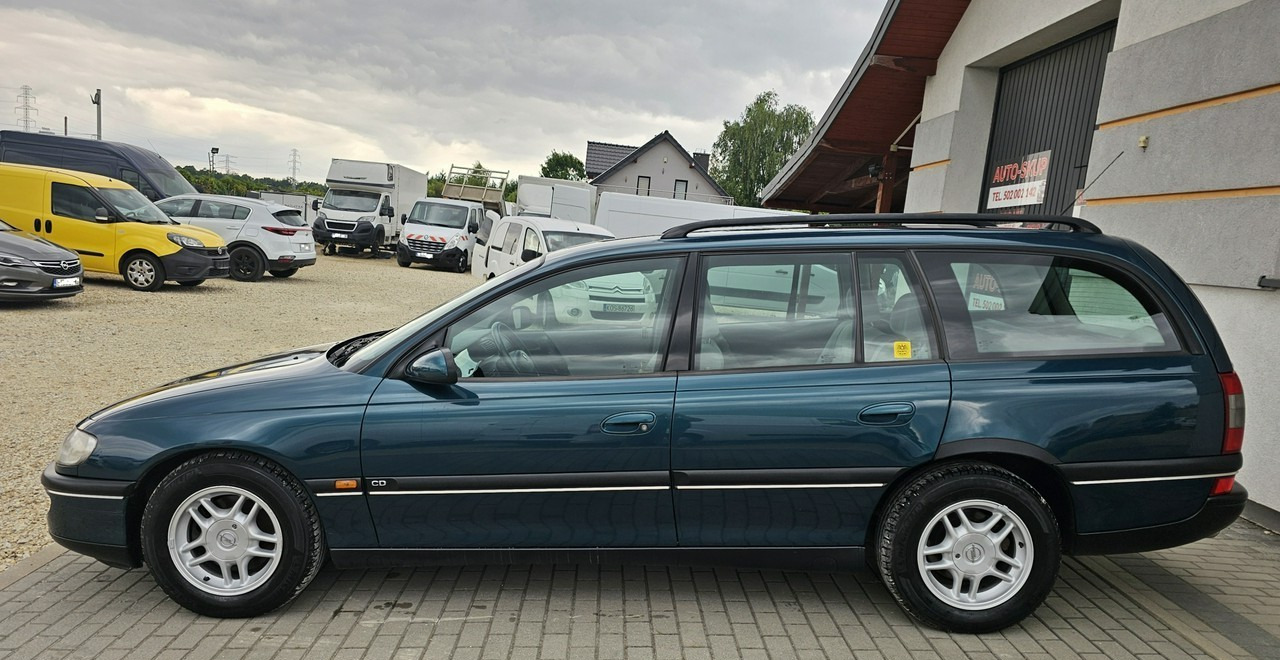 Opel Omega B 2,5 v6 *automat* napęd tył *welury* - Voiture: photos 4 Opel Omega B 2,5 v6 *automat* napęd tył *welury* - Voiture: photos 4