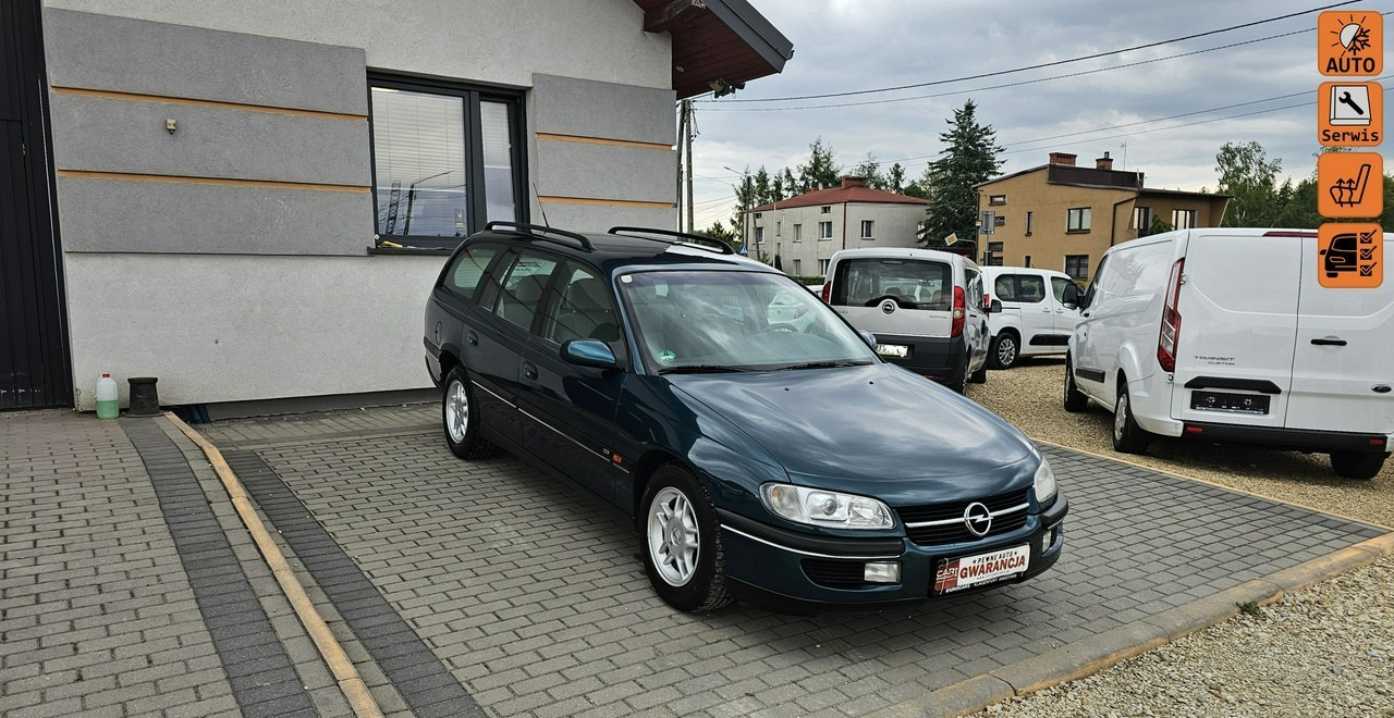Opel Omega B 2,5 v6 *automat* napęd tył *welury* - Voiture: photos 1 Opel Omega B 2,5 v6 *automat* napęd tył *welury* - Voiture: photos 1