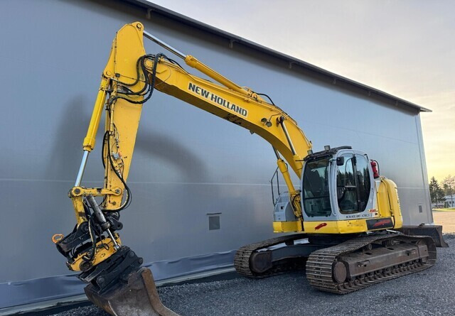 New Holland E235SR - Pelle sur chenille: photos 1 New Holland E235SR - Pelle sur chenille: photos 1