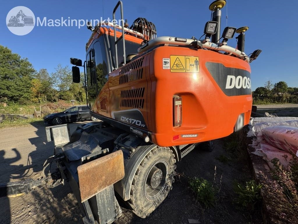 Doosan DX 170 W-5 + Tippvagn + Redskap - Pelle sur pneus: photos 3 Doosan DX 170 W-5 + Tippvagn + Redskap - Pelle sur pneus: photos 3