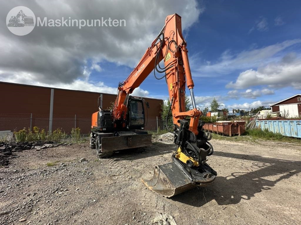 Hitachi ZX 140 W-5B - Pelle sur pneus: photos 3 Hitachi ZX 140 W-5B - Pelle sur pneus: photos 3