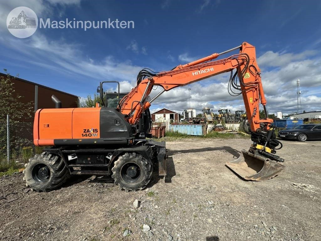 Hitachi ZX 140 W-5B - Pelle sur pneus: photos 4 Hitachi ZX 140 W-5B - Pelle sur pneus: photos 4