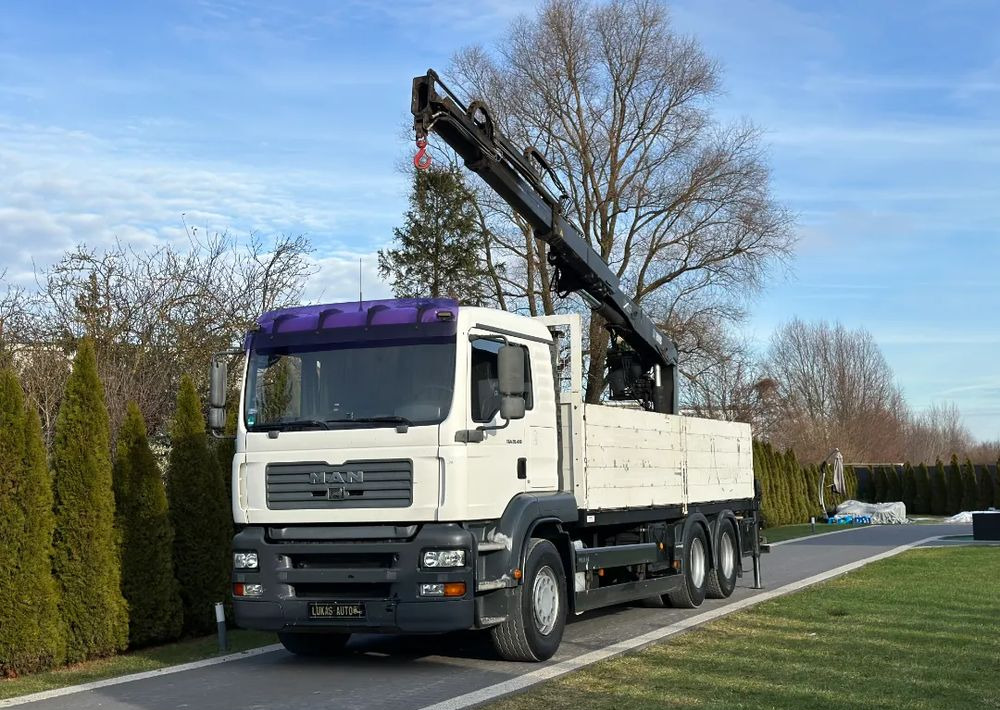 MAN TGA 24.410 6x4 HIAB MANUAL - Camion plateau, Camion grue: photos 1 MAN TGA 24.410 6x4 HIAB MANUAL - Camion plateau, Camion grue: photos 1