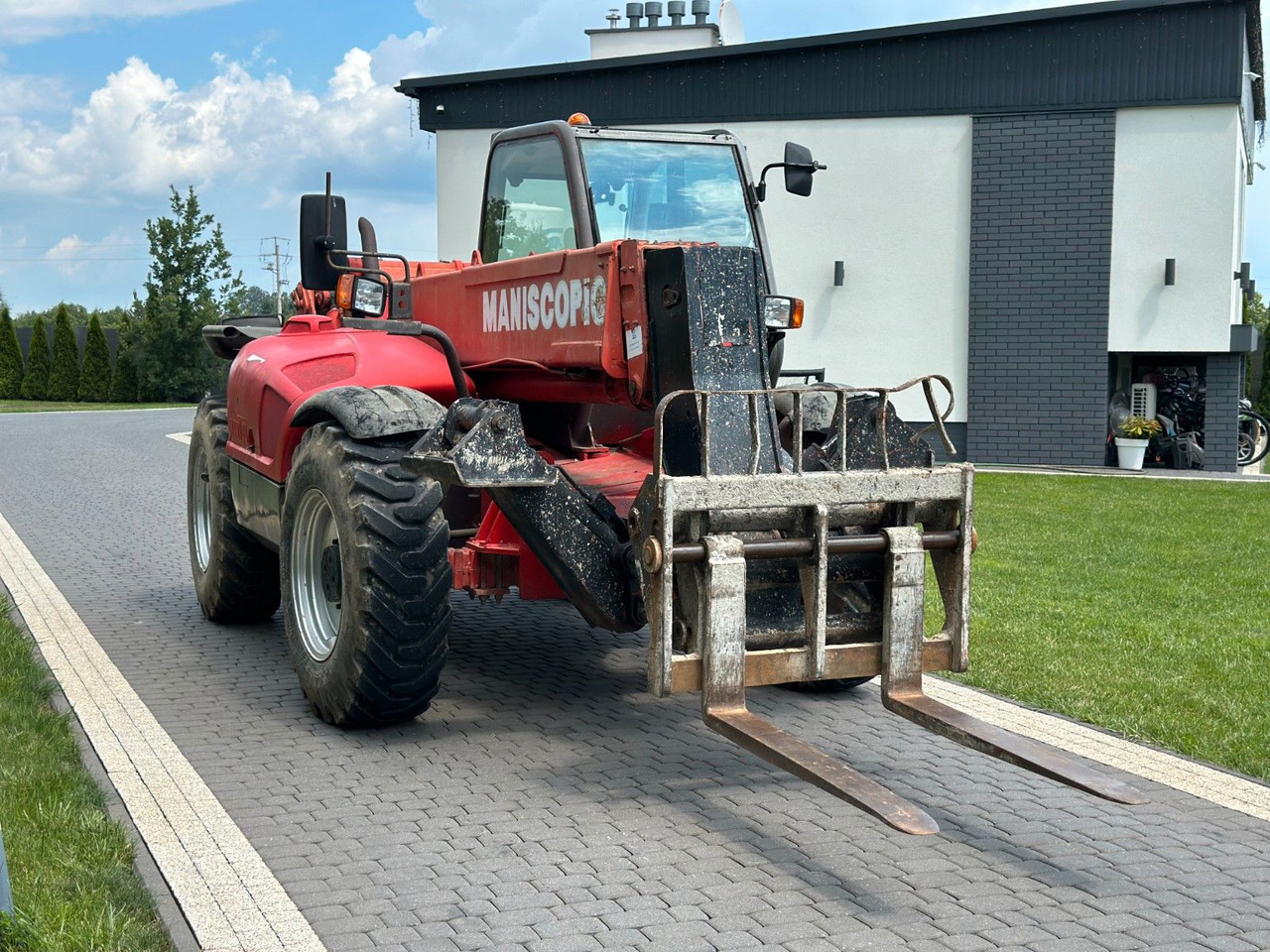 Manitou MT 1233S 12 M - Chariot télescopique: photos 1 Manitou MT 1233S 12 M - Chariot télescopique: photos 1