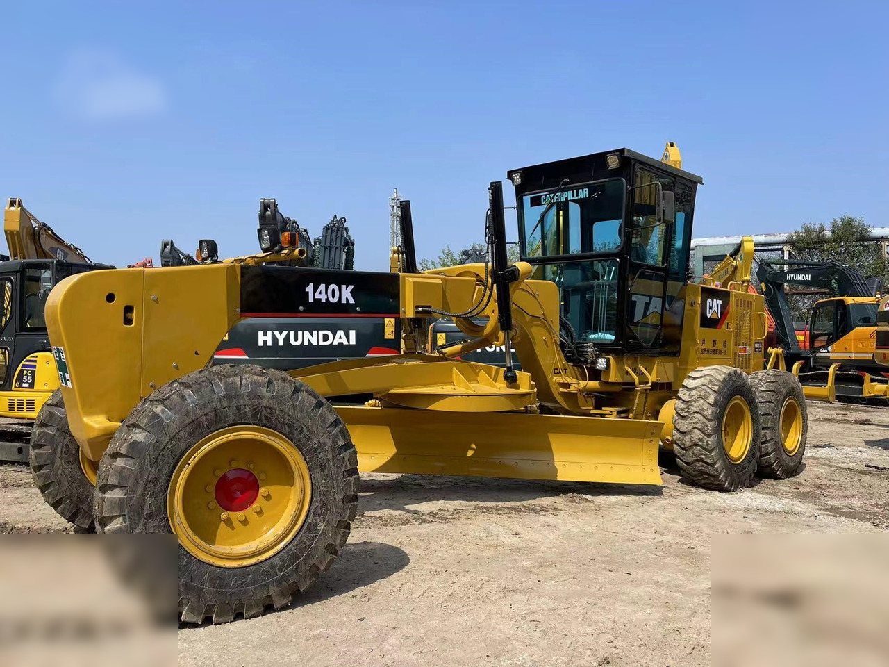 CATERPILLAR 140K - Niveleuse: photos 1 CATERPILLAR 140K - Niveleuse: photos 1