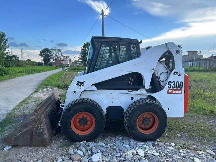 Used Bob Cat Bob Cat S300 Used Mini Skid Steer Wheel Loader Multifunctional Track Loaders Bobcat S300 - Mini chargeuse: photos 4 Used Bob Cat Bob Cat S300 Used Mini Skid Steer Wheel Loader Multifunctional Track Loaders Bobcat S300 - Mini chargeuse: photos 4