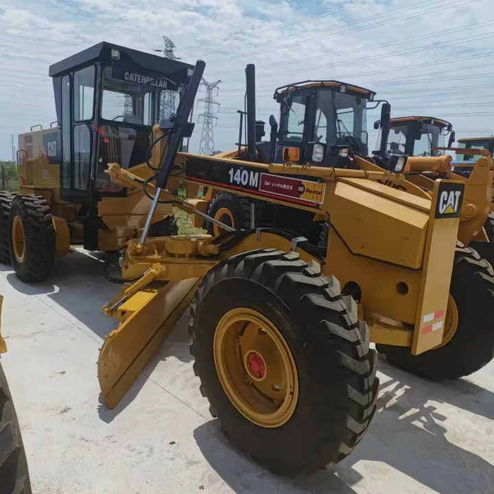 Used Japan Imported Caterpillar 140M Cat 140m Motor Grader with Good Quality and Low Price for Sale - Pelle: photos 1 Used Japan Imported Caterpillar 140M Cat 140m Motor Grader with Good Quality and Low Price for Sale - Pelle: photos 1
