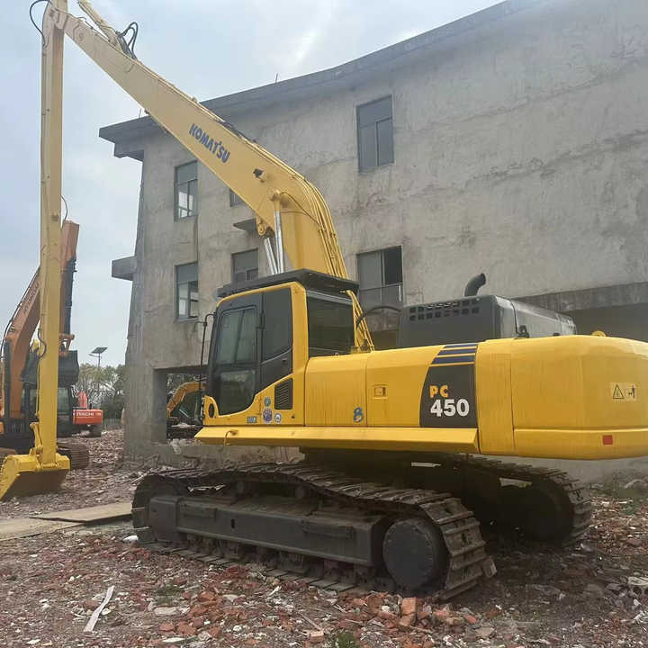 Used Komatsu PC450-8 Excavator Carrying Extra Long Arm Superior Performance Used Komatsu 45 Tonne Hydraulic Excavator Hot Sale - Pelle sur chenille: photos 1 Used Komatsu PC450-8 Excavator Carrying Extra Long Arm Superior Performance Used Komatsu 45 Tonne Hydraulic Excavator Hot Sale - Pelle sur chenille: photos 1