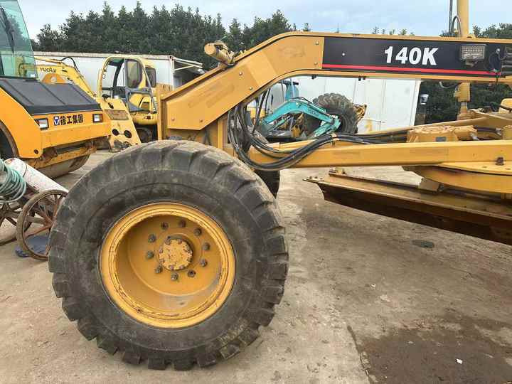 Used CAT 140K Land Road Motor Graer CAT140k Used Grader Cheap Price for Sale - Niveleuse: photos 4 Used CAT 140K Land Road Motor Graer CAT140k Used Grader Cheap Price for Sale - Niveleuse: photos 4