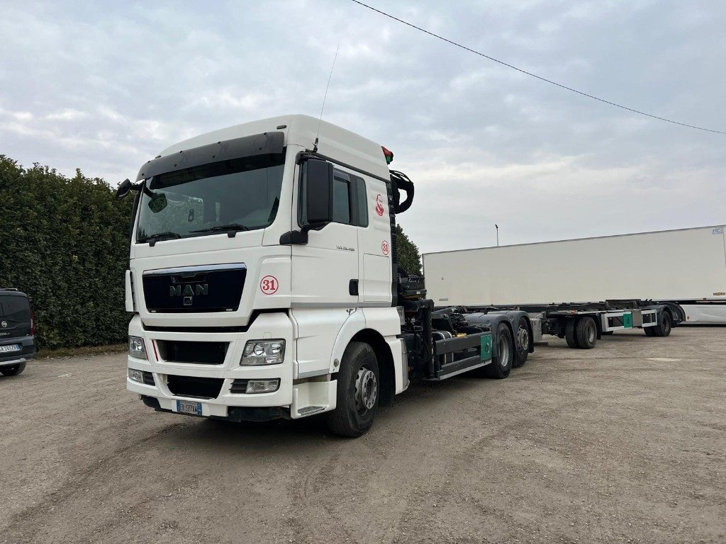 MAN TGX 26.480 SCARRABILE CON GRU - Camion ampliroll, Camion grue: photos 1 MAN TGX 26.480 SCARRABILE CON GRU - Camion ampliroll, Camion grue: photos 1