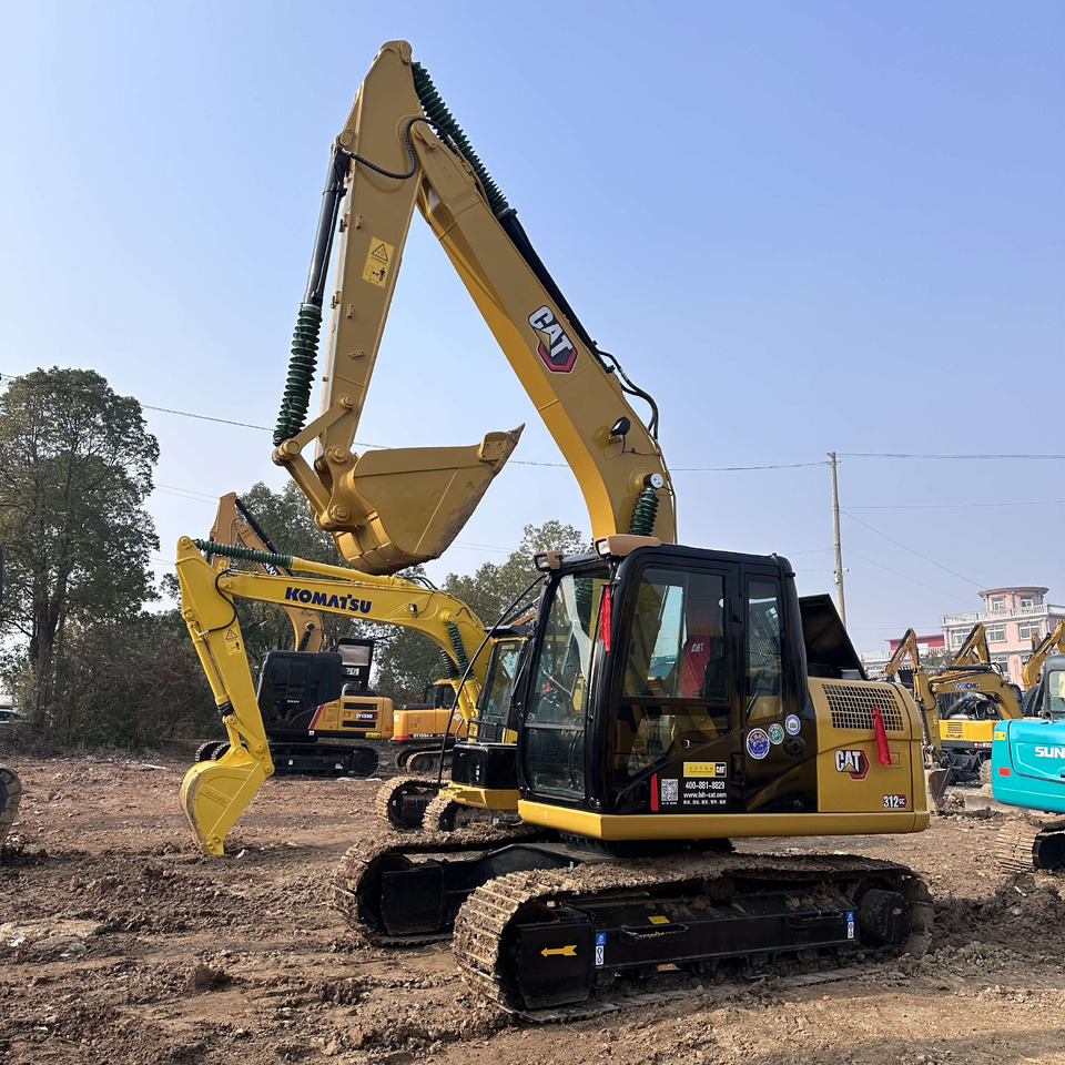CATERPILLAR 312GC Wheel Excavator Click for Discount - Pelle sur pneus: photos 1 CATERPILLAR 312GC Wheel Excavator Click for Discount - Pelle sur pneus: photos 1