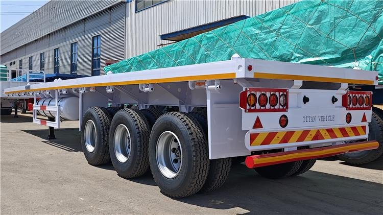 TITAN 40ft Tri Axle Flatbed Semi Trailer for Sale Price In Nigeria Lagos - Semi-remorque porte-conteneur/ Caisse mobile: photos 3 TITAN 40ft Tri Axle Flatbed Semi Trailer for Sale Price In Nigeria Lagos - Semi-remorque porte-conteneur/ Caisse mobile: photos 3