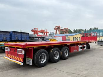 TITAN Flatbed Tri Axle Truck Trailer for Sale in Tanzania - Semi-remorque plateau: photos 3 TITAN Flatbed Tri Axle Truck Trailer for Sale in Tanzania - Semi-remorque plateau: photos 3