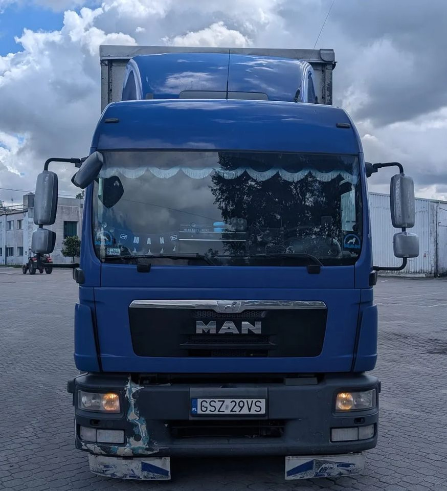 MAN TGL 8.250 - Camion à rideaux coulissants: photos 1 MAN TGL 8.250 - Camion à rideaux coulissants: photos 1