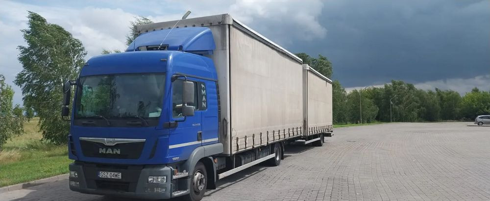 MAN TRUCK TGL - Camion à rideaux coulissants: photos 1 MAN TRUCK TGL - Camion à rideaux coulissants: photos 1