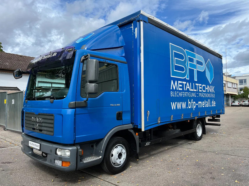 MAN TGL 8.180 BL *Pritsche/Plane*Tautliner*Klima* - Camion à rideaux coulissants: photos 1 MAN TGL 8.180 BL *Pritsche/Plane*Tautliner*Klima* - Camion à rideaux coulissants: photos 1