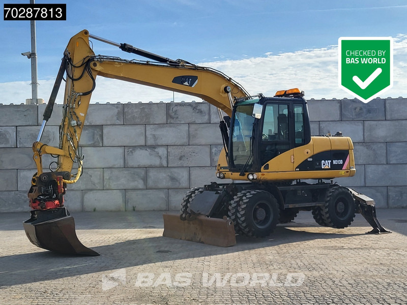 Caterpillar M313 D OUTRIGGERS + BLADE - Pelle sur pneus: photos 1 Caterpillar M313 D OUTRIGGERS + BLADE - Pelle sur pneus: photos 1