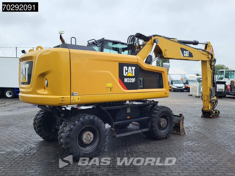 Caterpillar M320 F - Pelle sur pneus: photos 5 Caterpillar M320 F - Pelle sur pneus: photos 5