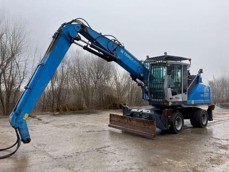 Fuchs MHL 320 - Pelle de manutention: photos 1 Fuchs MHL 320 - Pelle de manutention: photos 1