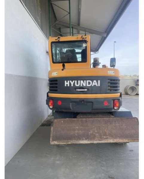 Hyundai R55W-9A - Pelle sur pneus: photos 3 Hyundai R55W-9A - Pelle sur pneus: photos 3