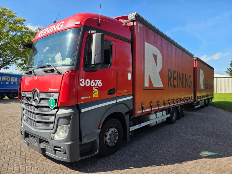 Mercedes-Benz Actros 2545 6X2 Retarder Volumecombi - Camion à rideaux coulissants: photos 1 Mercedes-Benz Actros 2545 6X2 Retarder Volumecombi - Camion à rideaux coulissants: photos 1
