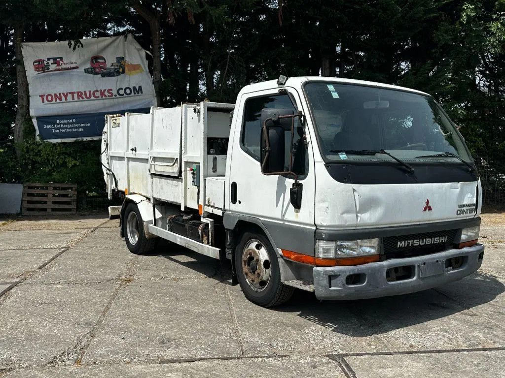 Mitsubishi Canter GARBAGE TRUCK SPRING/SPRING MANUAL GEARBO - Benne à ordures ménagères: photos 1 Mitsubishi Canter GARBAGE TRUCK SPRING/SPRING MANUAL GEARBO - Benne à ordures ménagères: photos 1