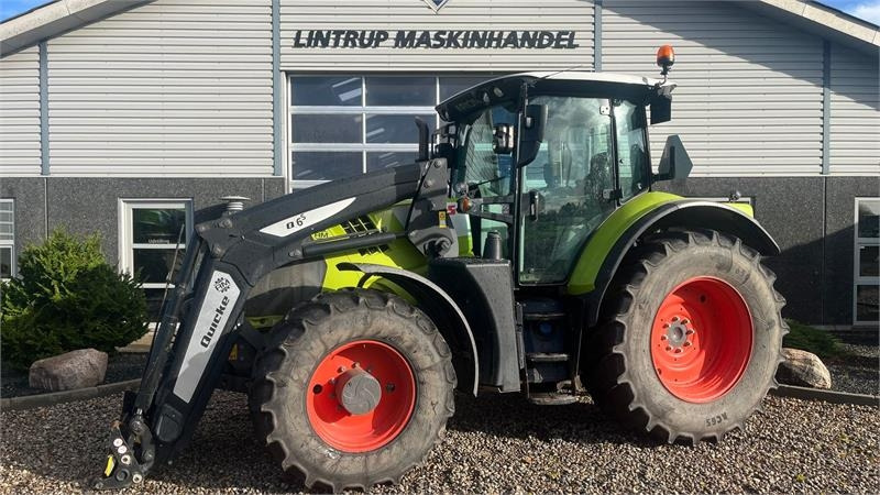 Claas ARION 650 CIS+ Focus med frontlift og frontlæsser - Tracteur agricole: photos 1 Claas ARION 650 CIS+ Focus med frontlift og frontlæsser - Tracteur agricole: photos 1