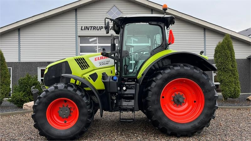 Claas Axion 830 Med frontlift. Velholdt traktor. - Tracteur agricole: photos 1 Claas Axion 830 Med frontlift. Velholdt traktor. - Tracteur agricole: photos 1