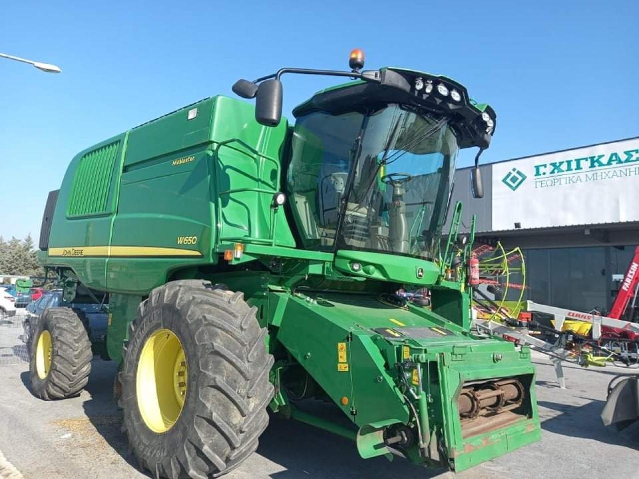 John Deere W650 - Moissonneuse-batteuse: photos 1 John Deere W650 - Moissonneuse-batteuse: photos 1